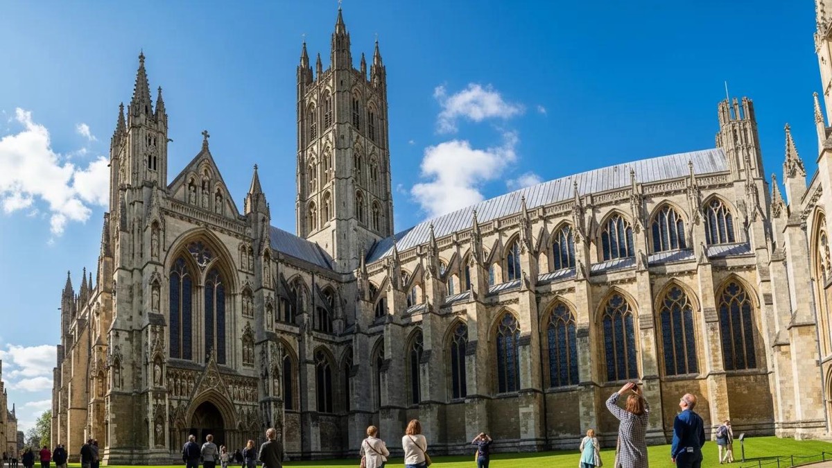 Canterbury Cathedral's Gothic architecture with visitors admiring its grandeur