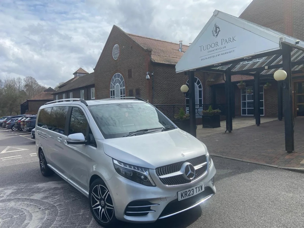 Luxury executive vehicle for airport transfer, illustrating premium travel experience